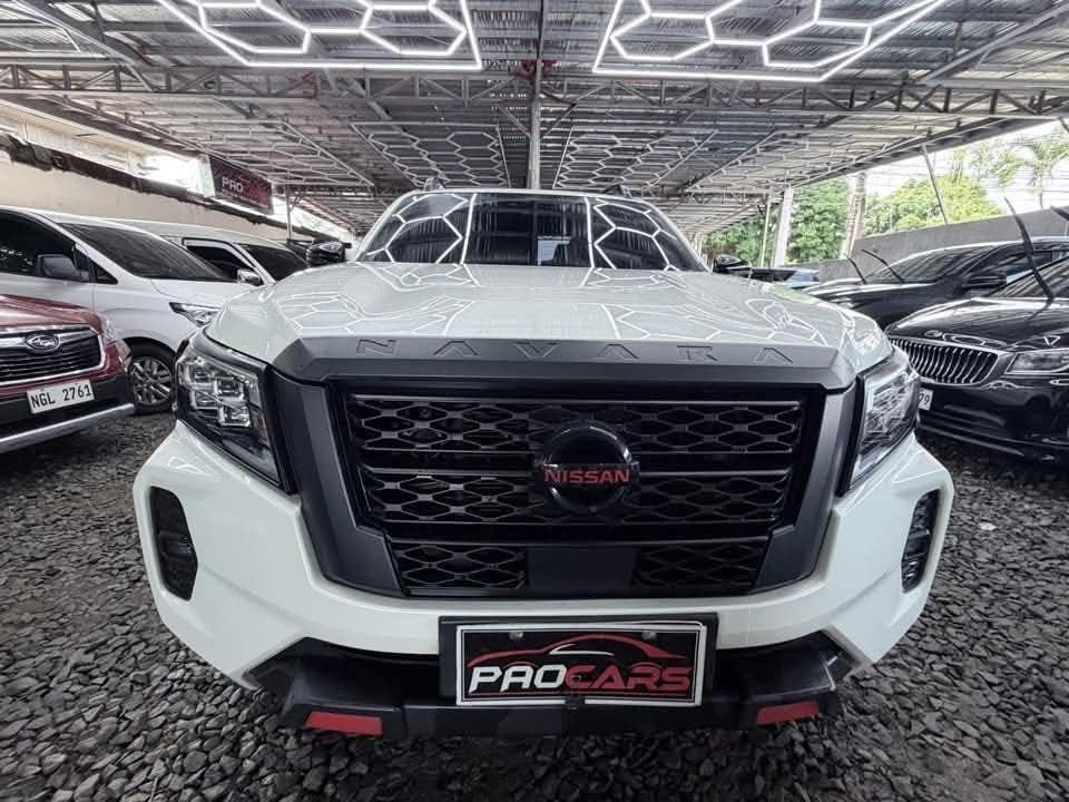 Nissan Navara Calibre-X Auto (Category: Used Cars) located in Manila. Submitted by quality_cars (Listing ID 1455437509, Image 1). Description: FOR SALE ‼️ 💥 NISSAN NAVARA CALIBRE-X 💥 ➡️ 2025 Model acquired ➡️ TOP OF THE LINE ➡️ SAVE 1m from brandnew price ➡️ 2.5L Diesel/ Limited Edition ➡️ All power ➡️ Aspen Pearl white ➡️ Matic Trans ➡️ Push Start Button ➡️ Steering Wheel Controls ➡️ OEM HeadUnit (360’ Camera) ➡️ Smooth Shifting no delay ➡️ Ve