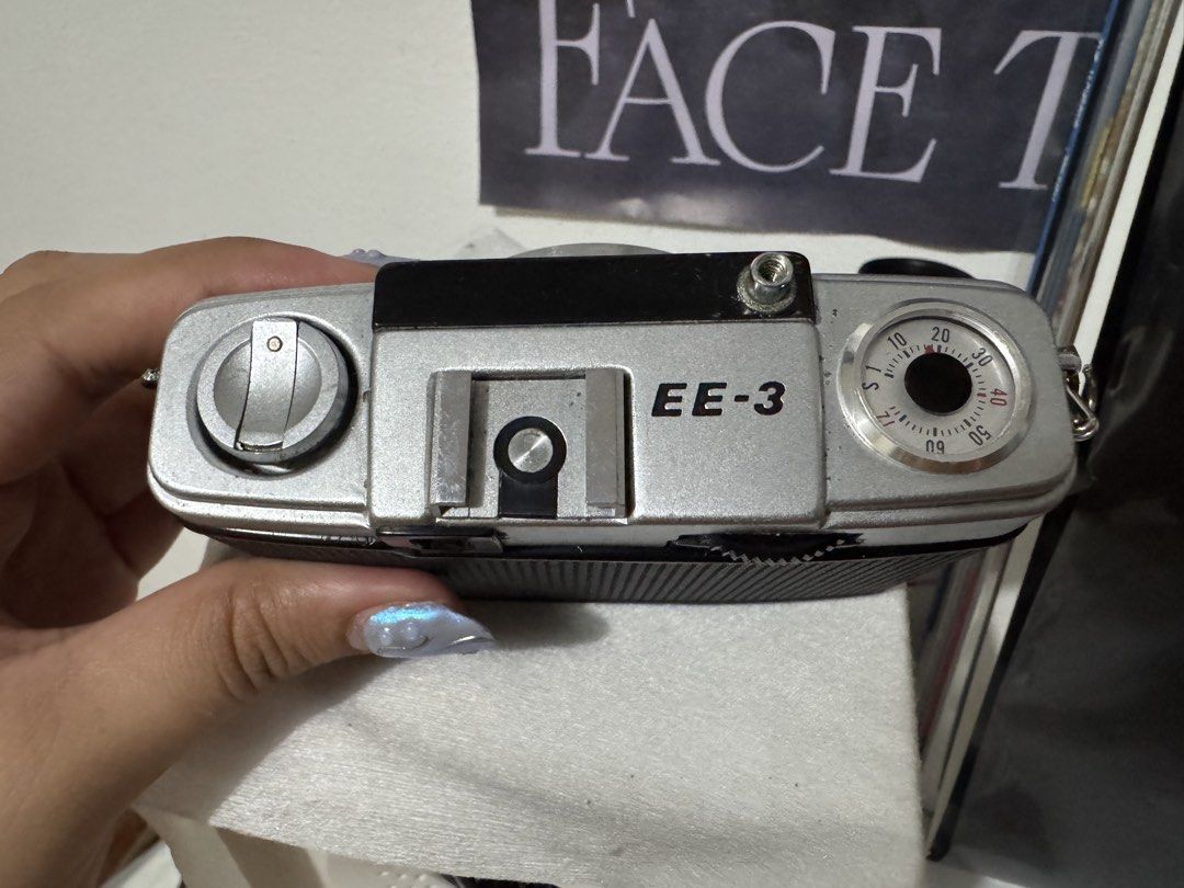 Olympus Pen EE-3 Half Frame Film Camera (Category: Cameras) located in Mangaldan. Submitted by nanabanana13 (Listing ID 1455403050, Image 2). Description: Classic Olympus half-frame film camera -Working selenium meter -Takes 72 shots from a 36-exposure roll -Compact (just the size of your hand) -Great for travel and everyday film photography -Comes with strap 📌 Condition: -Normal vintage wear. Overall still clean and presentable -No dents.