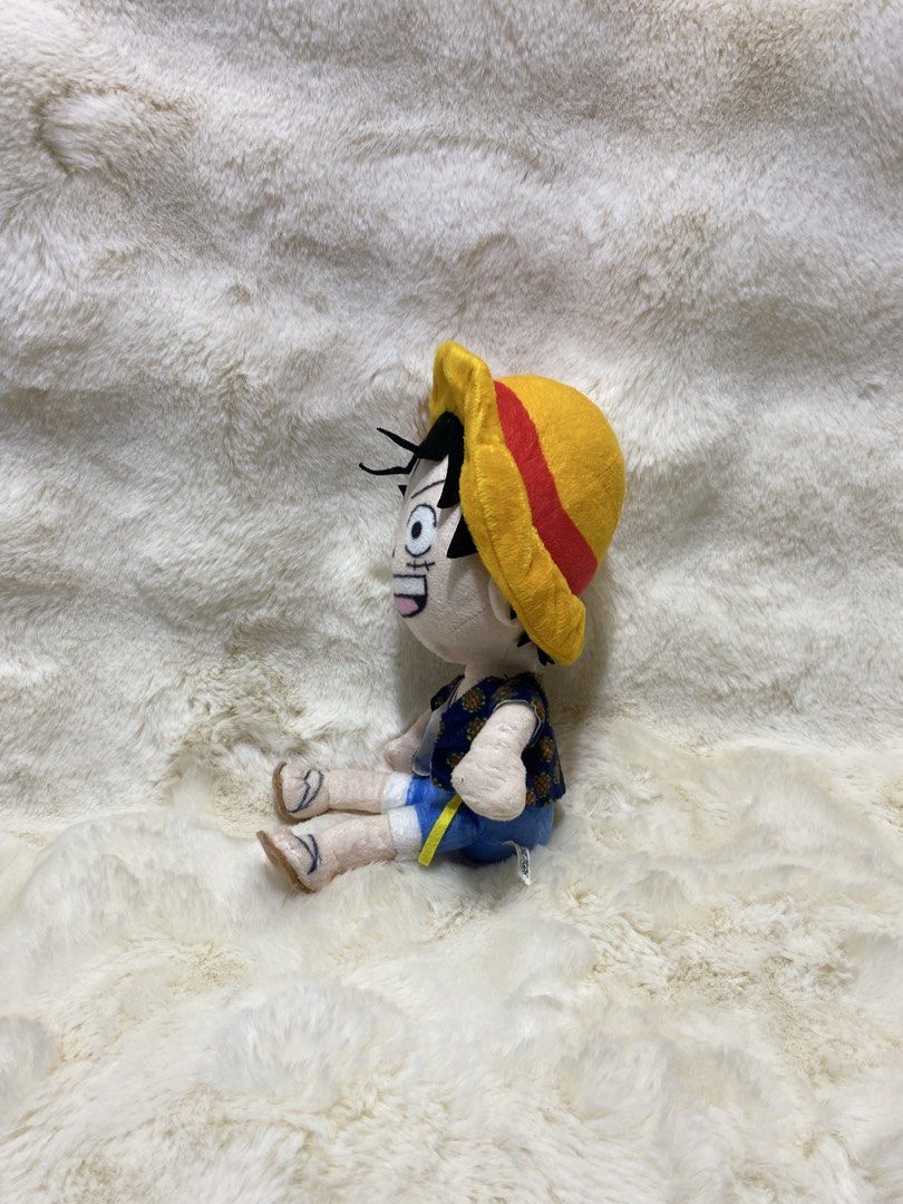 One Piece Monkey D. Luffy Plush Toy (Category: Plushies & Soft Toys) located in Kalibo. Submitted by ollie_stuffshop (Listing ID 1455492544, Image 2). Description: 24cm x 12cm Before you send your inquiries: ❗️Last Price is already posted ❗️Manage your expectations, WYSIWYG ❗️May need washing ❗️Shipping day is every Sunday - Cute Monkey D. Luffy plush toy from the anime One Piece. - Features his signature straw hat, blue shorts, and patterned shi