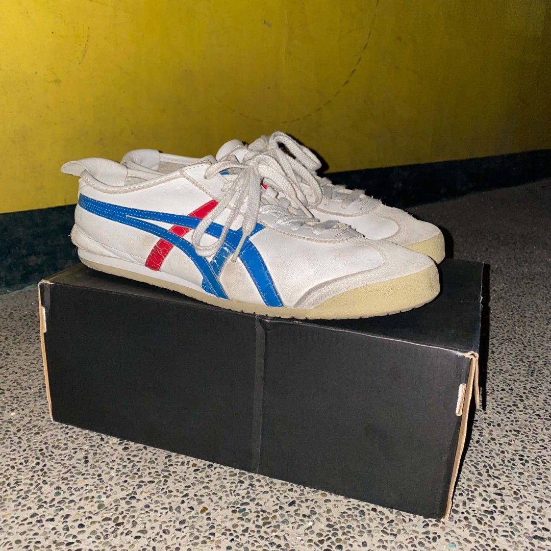 Onitsuka Tiger Mexico 66 size 9.5 (Category: Sneakers) located in Manila. Submitted by johnpm (Listing ID 1455464249, Image 2). Description: - Classic Onitsuka Tiger Mexico 66 sneakers - Color: White with blue and red stripes - Size: 9.5 US Men's / 11 US Women's - Origin: Made in Indonesia - Condition: Shows some signs of wear (please check photos) - Includes: Original box.