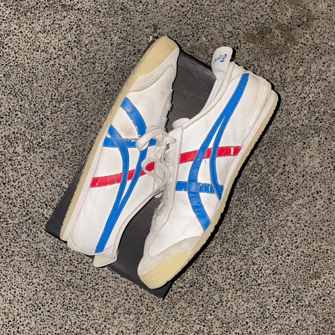 Onitsuka Tiger Mexico 66 size 9.5 (Category: Sneakers) located in Manila. Submitted by johnpm (Listing ID 1455464249, Image 3). Description: - Classic Onitsuka Tiger Mexico 66 sneakers - Color: White with blue and red stripes - Size: 9.5 US Men's / 11 US Women's - Origin: Made in Indonesia - Condition: Shows some signs of wear (please check photos) - Includes: Original box.