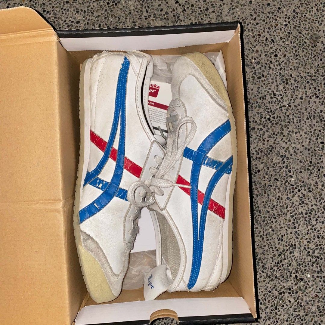 Onitsuka Tiger Mexico 66 size 9.5 (Category: Sneakers) located in Manila. Submitted by johnpm (Listing ID 1455464249, Image 1). Description: - Classic Onitsuka Tiger Mexico 66 sneakers - Color: White with blue and red stripes - Size: 9.5 US Men's / 11 US Women's - Origin: Made in Indonesia - Condition: Shows some signs of wear (please check photos) - Includes: Original box.