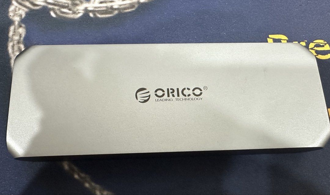 ORICO USB4 M.2 NVME SSD Enclosure (Category: Computer Parts) located in Manila. Submitted by hsahdin (Listing ID 1455404903, Image 3). Description: - ORICO USB4 M.2 NVMe SSD Enclosure - Supports up to 8TB capacity - Compatible with Thunderbolt 3/4 - High-speed data transfer up to 40 Gbps - Integrated cooling fan for optimal performance - Tool-free installation for easy setup Used with care. 100% functional. SSD in photo is for reference only..