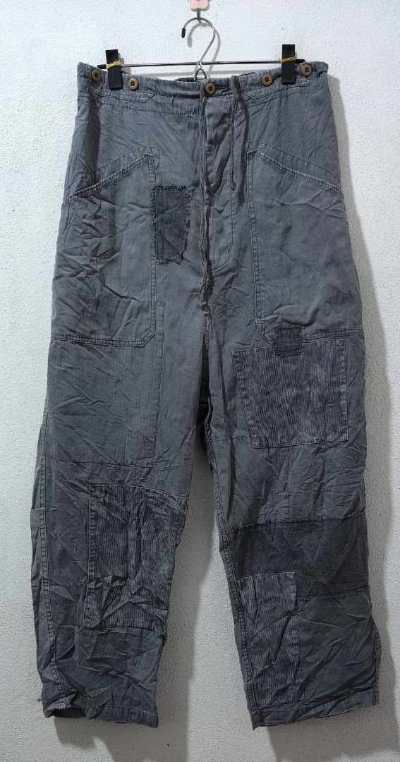 Patchwork Grey Pants (Category: Other Bottoms) located in Pasir Mas. Submitted by ekor.b (Listing ID 1455495597, Image 1). Description: - Unique grey patchwork pants - Features a variety of textures for a distinctive look - One size fits most - Made in China - Ideal for creating a casual outfit pinggang bergetah 32 - 34 inci labuh 42 inci.