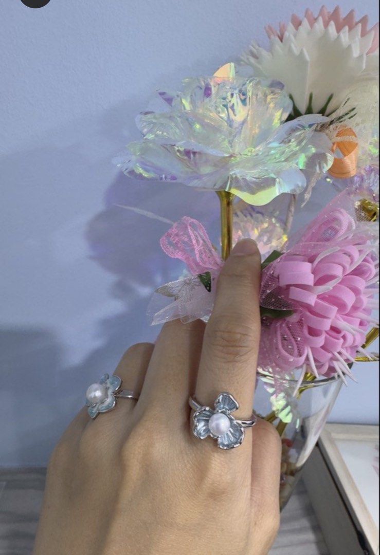 Pearl Ring (Category: Rings) located in Singapore. Submitted by tangping_99-6 (Listing ID 1455396921, Image 3). Description: - Adjustable pearl rings - S$10 each for 1st row ; S$15 for red flower (sold) - Made from natural freshwater pearl - Perfect for adding a subtle, elegant touch to any outfit.
