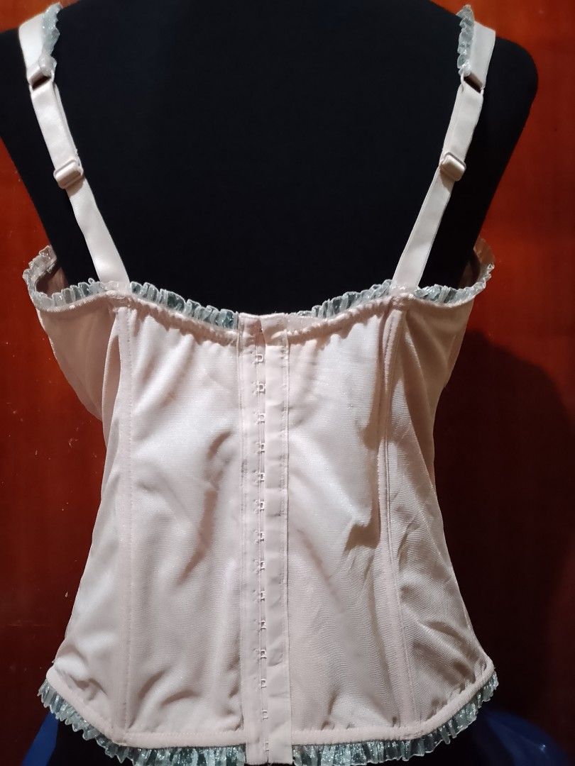 Pink Lace Corset Bustier Longline Bra (Category: Undergarments & Loungewear) located in Batangas. Submitted by sheenx.09 (Listing ID 1455387707, Image 2). Description: -size 40F (XL to 2xl) - Pink lace corset bustier - Adjustable straps for a perfect fit - Secure hook-and-eye closure at the back - Delicate lace trim along edges - Designed to shape and support - Versatile: great for layering or as a statement piece.