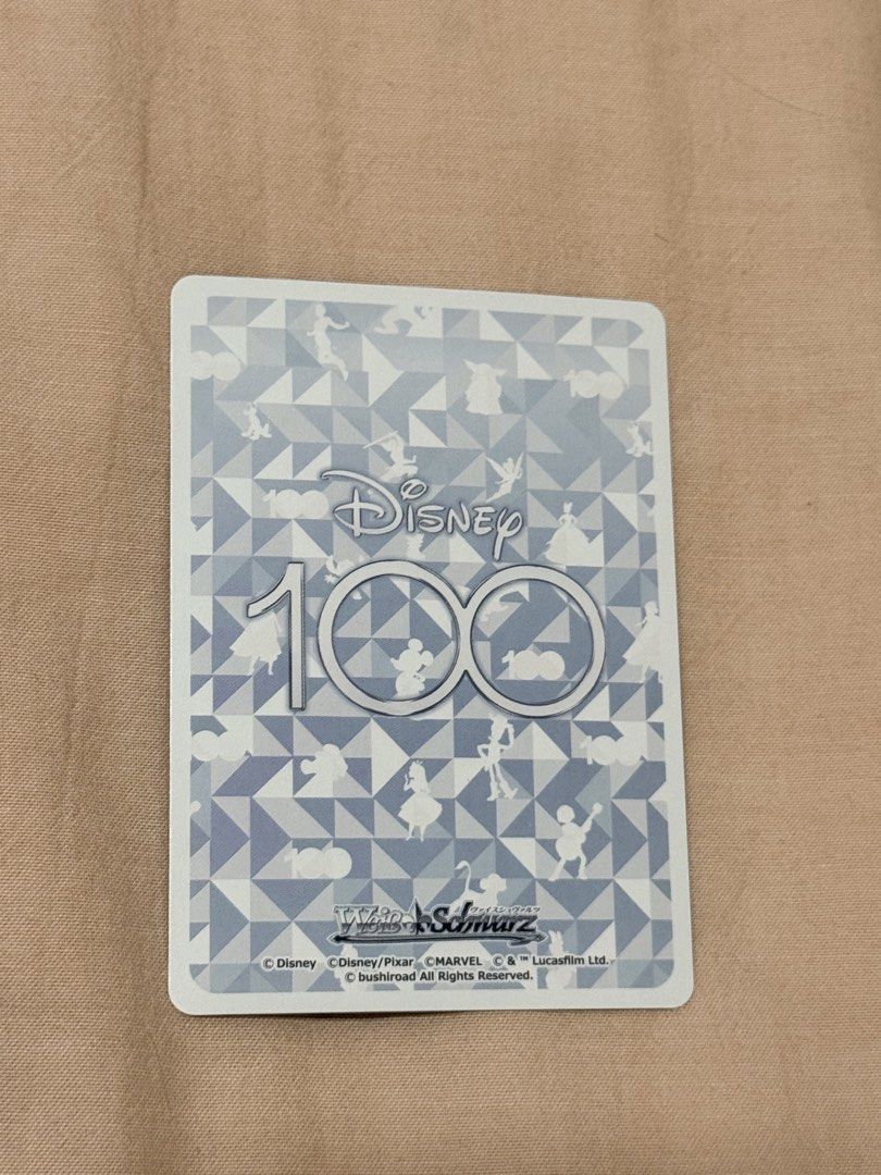 Pluto card (Category: Raw Cards) located in Singapore. Submitted by the_card_room (Listing ID 1455448835, Image 3). Description: Authentic Weiss Schwarz Disney 100 Years of Wonder Japanese card. Card: Pluto (Mickey & Friends) Code: Dds/S104-064SP Rarity: SP (Special Rare) Condition: Pristine Mint / Pack-Fresh. Placed straight into a protective plastic sleeve right after pulling. Absolutely NO scratches, whitening, or surface damage. Dealing Metho