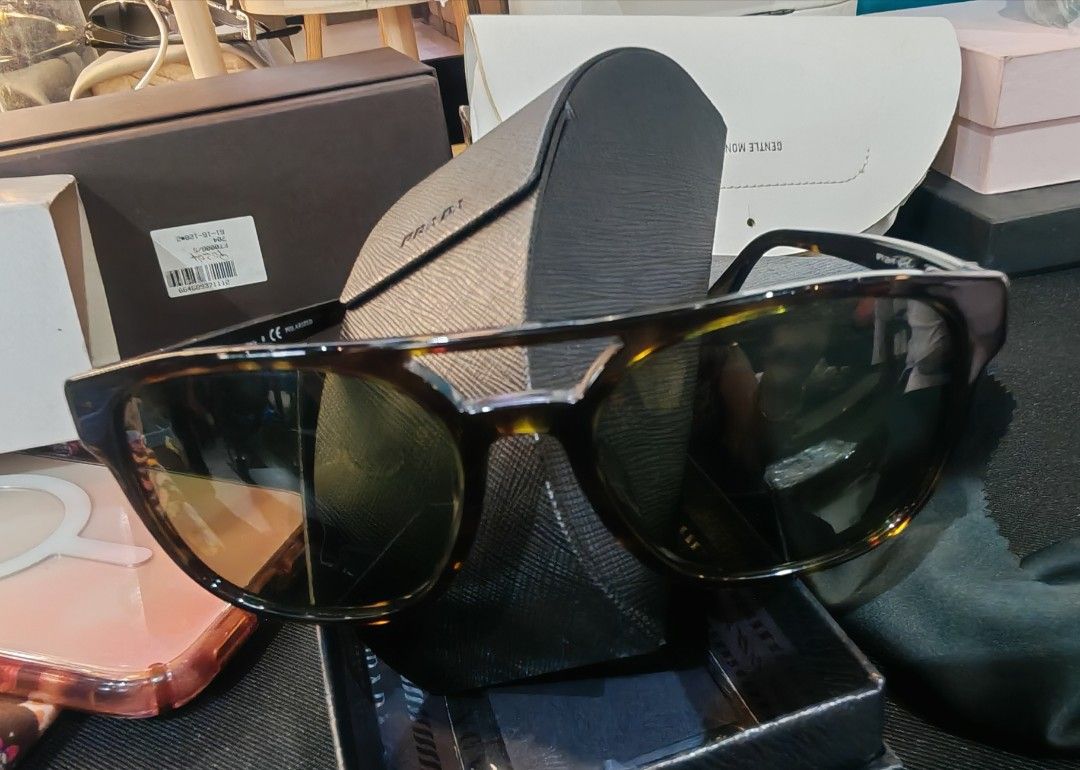 Prada Sunglasses Tortoiseshell Polarized (Category: Luxury Accessories) located in Caloocan City. Submitted by mommyella22 (Listing ID 1455471474, Image 1). Description: - Authentic Prada Sunglasses - Classic Tortoiseshell Pattern - Polarized Lenses for glare reduction - Comes with Original Prada Case - Ideal for sunny days.