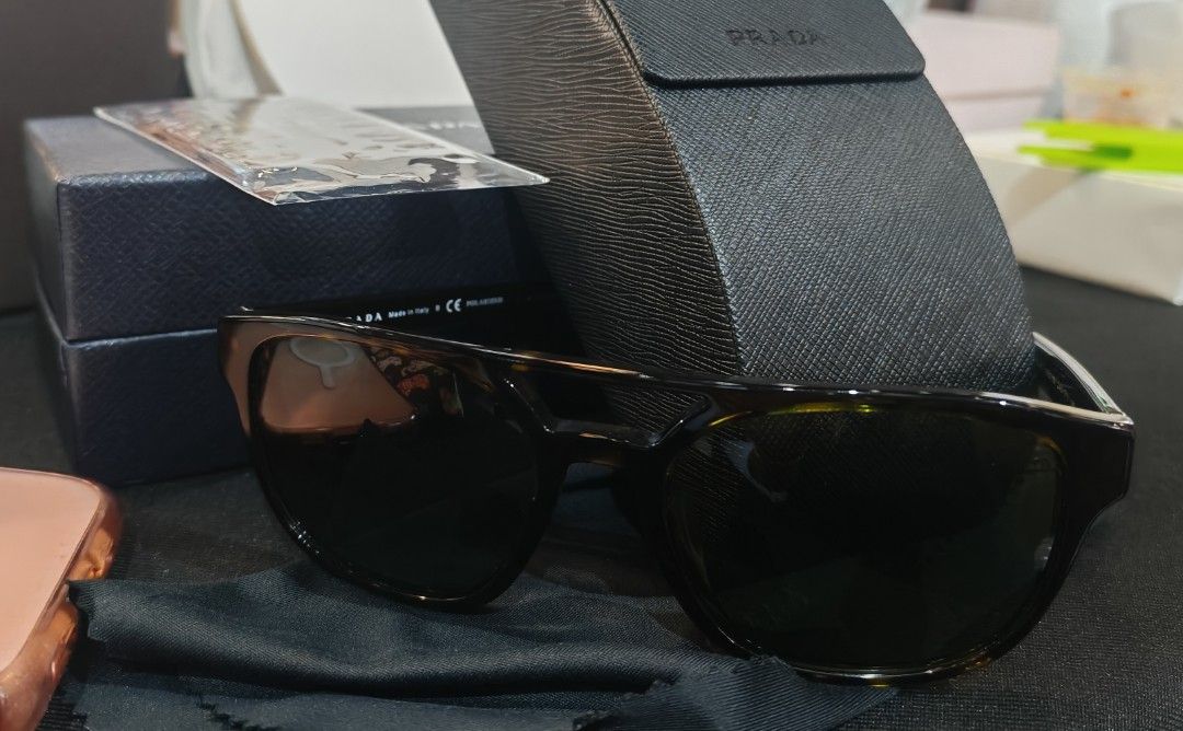 Prada Sunglasses Tortoiseshell Polarized (Category: Luxury Accessories) located in Caloocan City. Submitted by mommyella22 (Listing ID 1455471474, Image 3). Description: - Authentic Prada Sunglasses - Classic Tortoiseshell Pattern - Polarized Lenses for glare reduction - Comes with Original Prada Case - Ideal for sunny days.