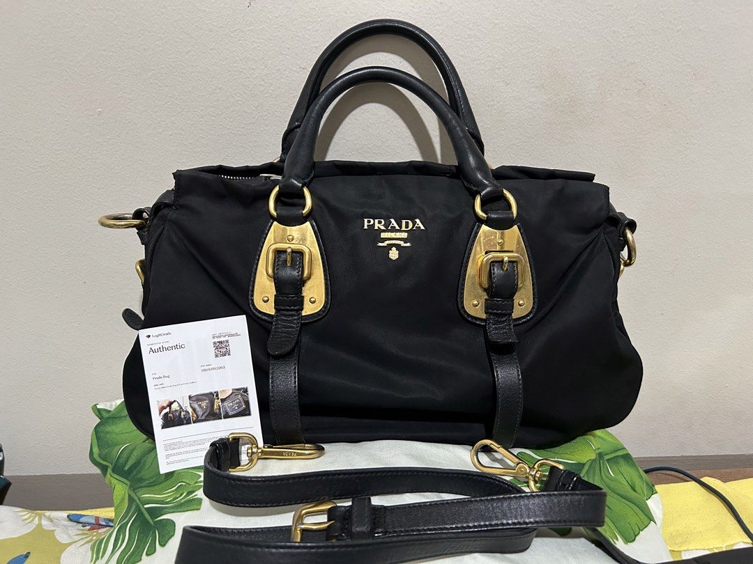 PRADA TESSUTO NYLON (Category: Luxury Bags & Wallets) located in Quezon City. Submitted by dropshopselections (Listing ID 1455343119, Image 1). Description: original with legit grails cert with original strap light tarnishing on the ghw approx 13 x 7.5 x 4.5 inches.