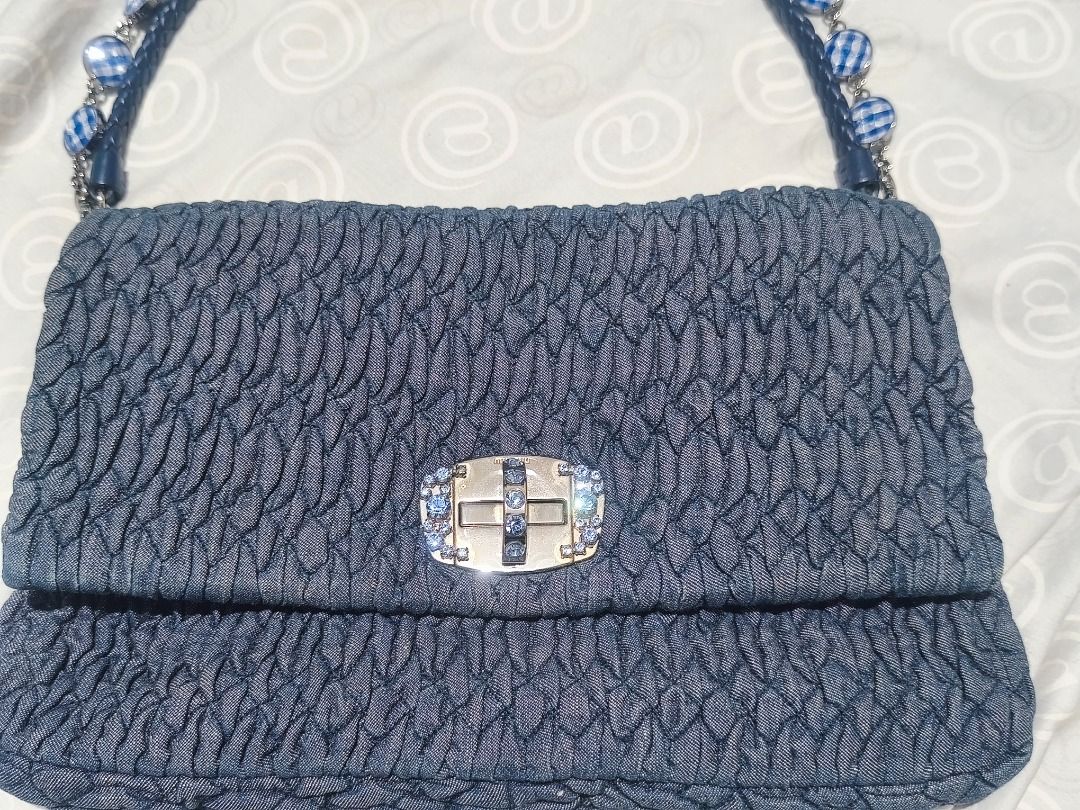 Pre loved miumiu bag (Category: Luxury Bags & Wallets) located in Caloocan City. Submitted by rociel21 (Listing ID 1455468720, Image 2). Description: Pre loved bag in good condition, comes with dustbag, authentication card left in dubai.