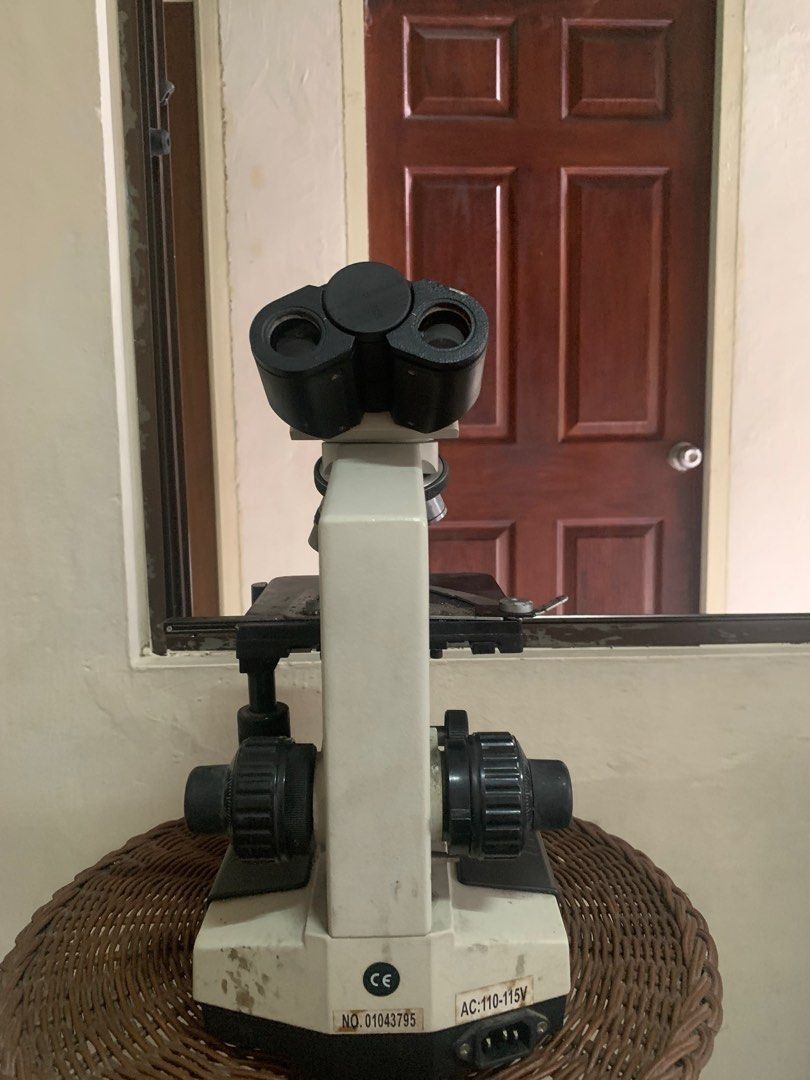 Professional Microscope with Multiple Lenses (Category: Medical Supplies & Tools) located in Quezon City. Submitted by carlos132 (Listing ID 1455395763, Image 3). Description: - Needs Bulb. - Microscope perfect for science projects and study. - Includes multiple objective lenses for versatile magnification. - Comes with WF10X and WF16X eyepieces. - Features adjustable focus knobs for clear viewing. - Power input: AC 110-115V. - Minor dust from st