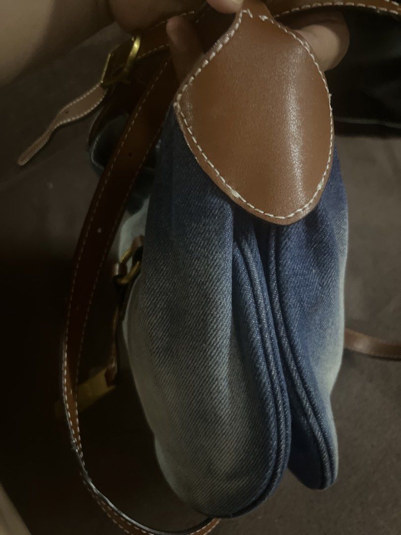 Ralph Lauren (Category: Luxury Bags & Wallets) located in Quezon City. Submitted by retann (Listing ID 1454391099, Image 3). Description: - Cute Ralph Lauren shoulder bag - Denim material with a cool ombre effect (dark blue to light) - Brown leather accents and strap - Signature Ralph Lauren polo player charm - Great for everyday use - Fits essentials.