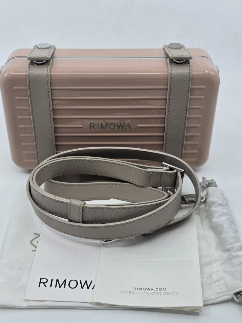 RIMOWA CLUTCH (Category: Luxury Bags & Wallets) located in Quezon City. Submitted by nadine_miel (Listing ID 1455444909, Image 1). Description: Rimowa Clutch dessert rose pink 100+++ pa sa store my price: 85k nlng.