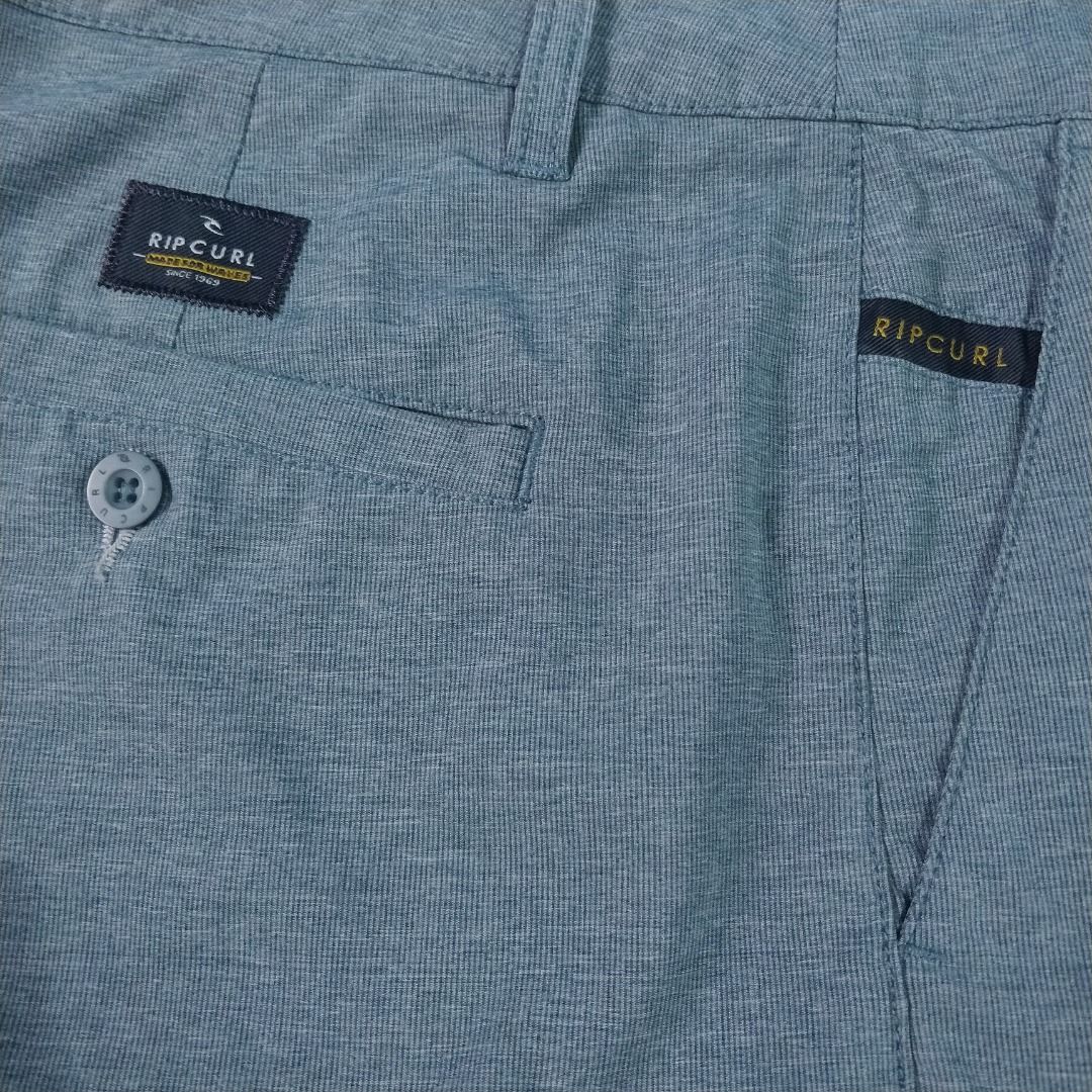 Ripcurl Hybrid Chino Shorts (Category: Shorts) located in Caloocan City. Submitted by thearchiverack (Listing ID 1455452913, Image 2). Description: Ripcurl Boardwalk Hybrid Shorts Color:Green/Grey Size on tag: 34 (fit 36) W18xL21 Honest Condition: Good as new with minor issue Faded print inner waist band(see last pic) Color rate: 10/10 Price: P400 + shipping .