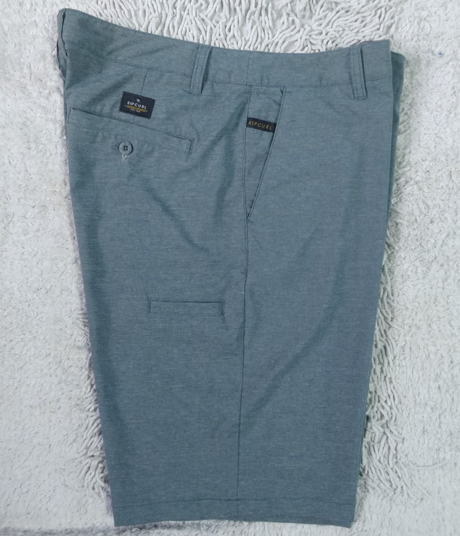 Ripcurl Hybrid Chino Shorts (Category: Shorts) located in Caloocan City. Submitted by thearchiverack (Listing ID 1455452913, Image 3). Description: Ripcurl Boardwalk Hybrid Shorts Color:Green/Grey Size on tag: 34 (fit 36) W18xL21 Honest Condition: Good as new with minor issue Faded print inner waist band(see last pic) Color rate: 10/10 Price: P400 + shipping .