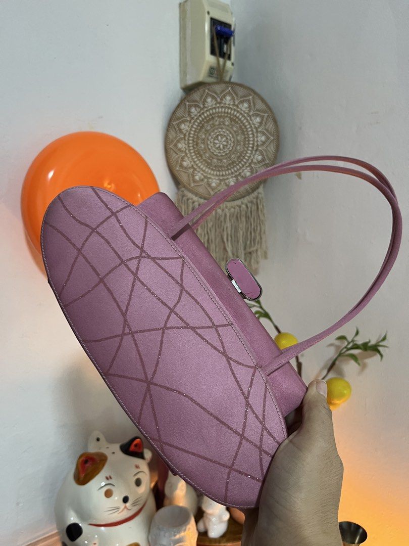 Rodo Pink Satin Quilted Handbag (Category: Luxury Bags & Wallets) located in Cavite. Submitted by meannefavila24 (Listing ID 1455441374, Image 2). Description: - Cute pink Rodo handbag - Satin material with subtle quilted pattern - Rodo logo lining - Small clasp closure - Thin matching strap - Ideal for nights out or adding a pop of color.
