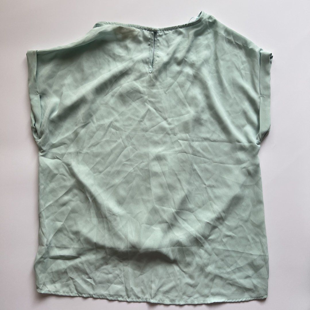 sage green blouse (Category: Blouses) located in Dasmarinas. Submitted by pinex (Listing ID 1455415168, Image 2). Description: - large on tag but will fit a medium best.