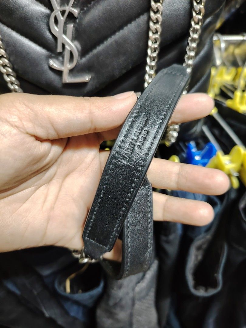 Saint Laurent Black Leather Chevron Flap Bag (Category: Luxury Bags & Wallets) located in Baguio. Submitted by XycerlynCLXN (Listing ID 1455323805, Image 2). Description: - Black Saint Laurent Flap Bag - Signature chevron quilting - Silver chain strap - Interior zip pocket - Embossed 'Saint Laurent Paris' on leather strap - A timeless and stylish accessory.