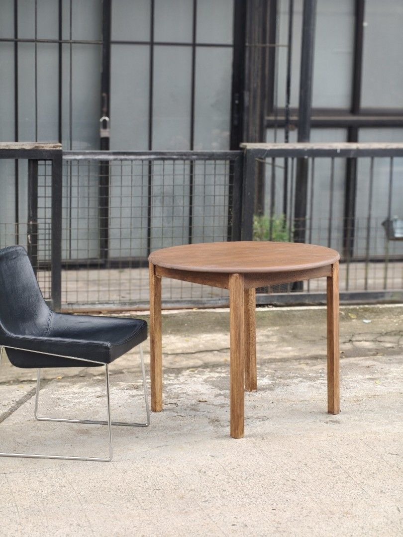 Solid wood round dining / cafe table (Category: Tables & Sets) located in Cavite. Submitted by yourownspace.tgyty (Listing ID 1455323849, Image 1). Description: newly refinished. solid wood round dining / cafe table.