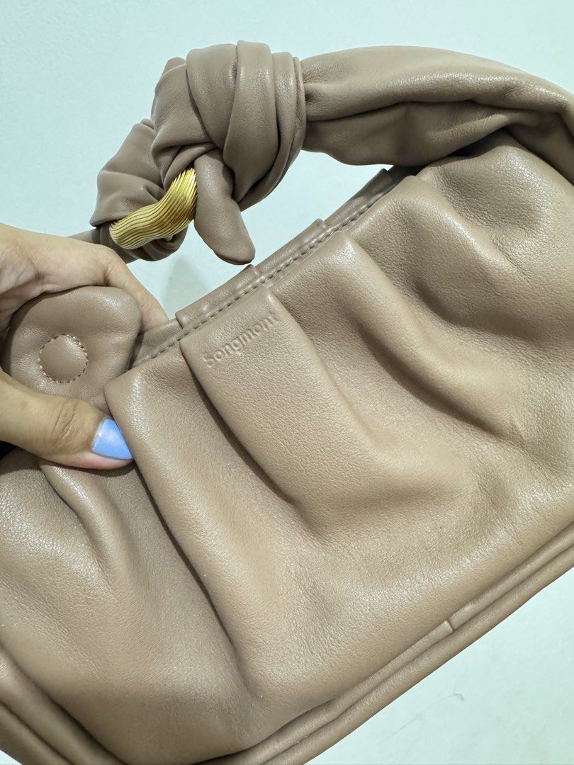 Songmont Wonton Bag (Category: Luxury Bags & Wallets) located in Manila. Submitted by wildriver.03c46c (Listing ID 1455440638, Image 3). Description: Pls check pics! Dm for any questions Bag only.