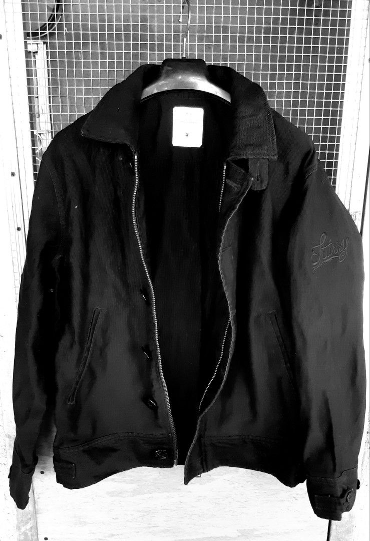 Stussy Limited Edition Yokohama Chapter Jacket (Category: Coats, Jackets and Outerwear) located in Malaybalay. Submitted by rielstuff (Listing ID 1455369351, Image 1). Description: Black Stussy jacket. Limited edition from the Yokohama Chapter. Has the Stussy logo embroidered on the sleeve. Button and zip closure. Two front pockets. Great for casual wear..