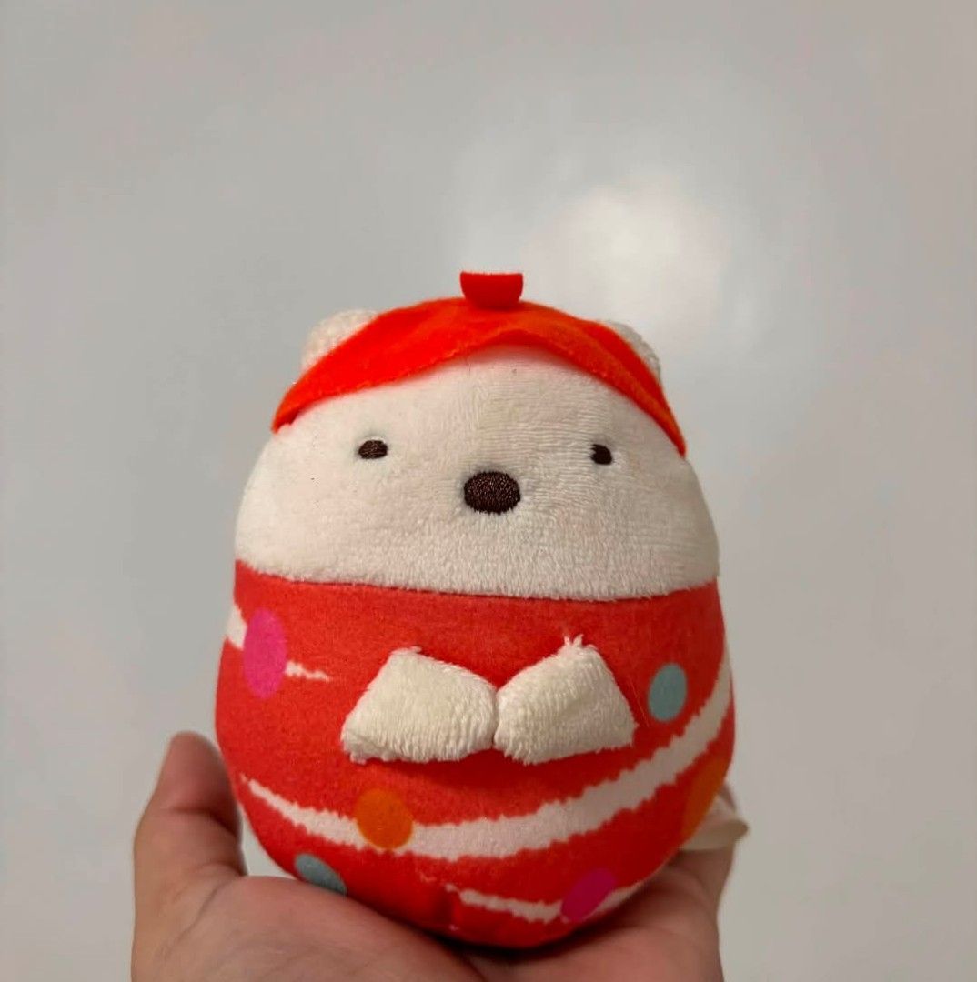 Sumikko San x plushie (Category: Plushies & Soft Toys) located in Cavite. Submitted by l1ttlelulu (Listing ID 1455474023, Image 1). Description: - Adorable round and soft plush toy - Features a cute little red hat - Red and white striped body with colorful polka dots - Includes small white hands - Approximately palm-sized - Ideal for collectors or as a small gift.