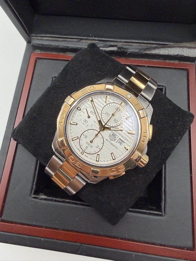 TAG Heuer Aquaracer Automatic Chronograph Two-Tone (Category: Luxury Watches) located in Manila. Submitted by rj_authenticwatchesandmore (Listing ID 1445641268, Image 1). Description: Tag Heuer Aquaracer Men Chronograph - Brand New Price 220k+ - Two Tone (18k plated and stainless steel) - Silver Teaked Dial - 42mm Case diameter - Automatic Chronograph Calibre 16 Inclusions: watch, double box, extra link, manual, card 9/10 condition Manila area.