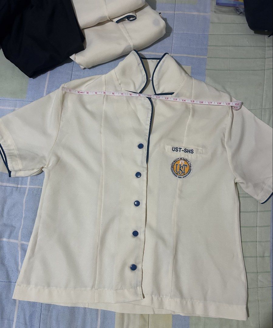 Take all: UST SHS Type A uniforms (Category: Sets & Coordinates) located in Marikina City. Submitted by decluttering.matters (Listing ID 1455422694, Image 3). Description: UST SHS Type A uniforms (Used) Take all: 3 polo and 2 pants Please see all photos for the measurements. Size 4XL (polo) 3XL (pants) Payment first via GCash. Items will be delivered personally to the buyer (meet up at Frassati or UST main campus) to make sure that the buyer is a