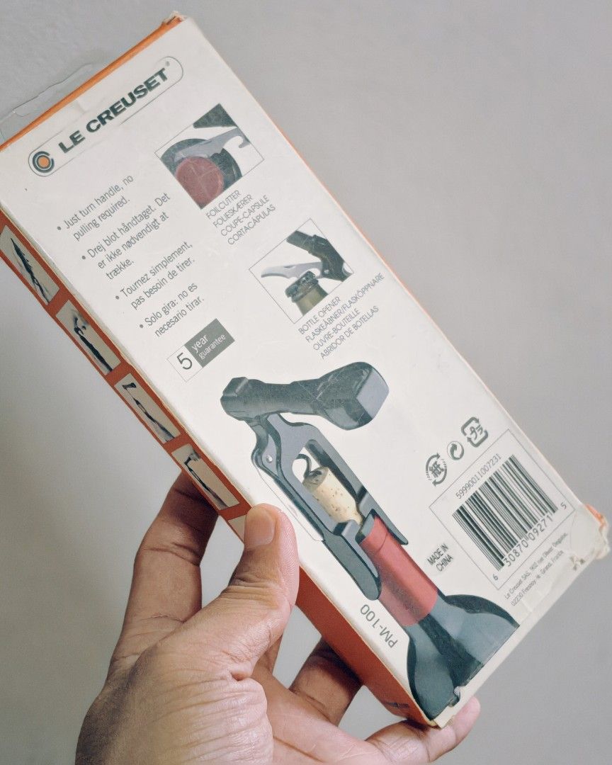 The Le Creuset PM-100 Pocket Model Corkscrew (Category: Dinnerware & Cutlery) located in Valenzuela. Submitted by mendozagz (Listing ID 1455421445, Image 2). Description: The Le Creuset PM-100 Pocket Model Corkscrew features a compact, durable plastic body in black onyx with a detachable handle that doubles as a foil cutter or alignment guide. Design: Lightweight, pocket-sized frame engineered for portable, effortless cork removal. Mechanism: Use