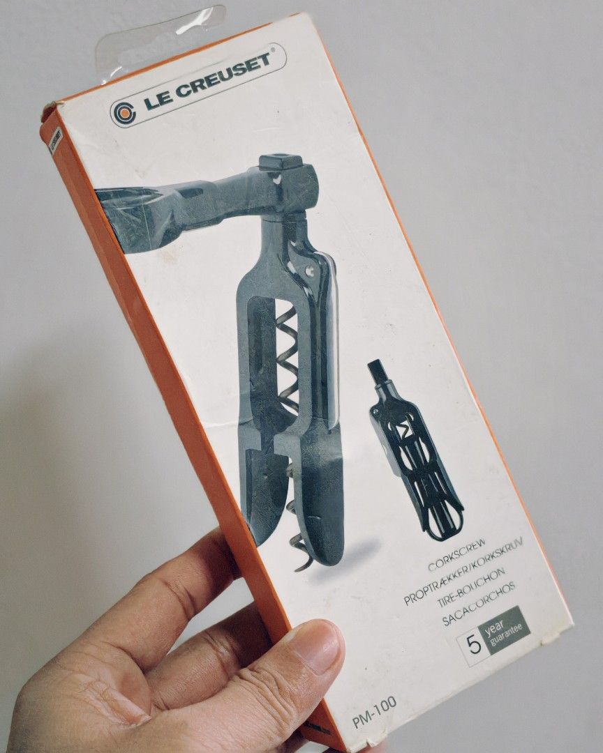 The Le Creuset PM-100 Pocket Model Corkscrew (Category: Dinnerware & Cutlery) located in Valenzuela. Submitted by mendozagz (Listing ID 1455421445, Image 1). Description: The Le Creuset PM-100 Pocket Model Corkscrew features a compact, durable plastic body in black onyx with a detachable handle that doubles as a foil cutter or alignment guide. Design: Lightweight, pocket-sized frame engineered for portable, effortless cork removal. Mechanism: Use