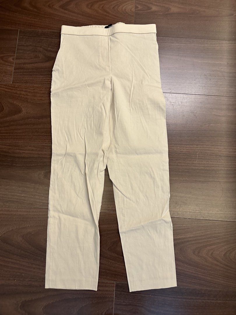Theory Beige Elastic Waist Pants Size 0 (Category: Other Bottoms) located in Quezon City. Submitted by bqchane (Listing ID 1455357810, Image 1). Description: - Theory Pants - Color: Light Beige - Size: 0 - Features: Elastic waistband, straight leg cut - Style: Simple, classic, versatile for everyday or dressing up.