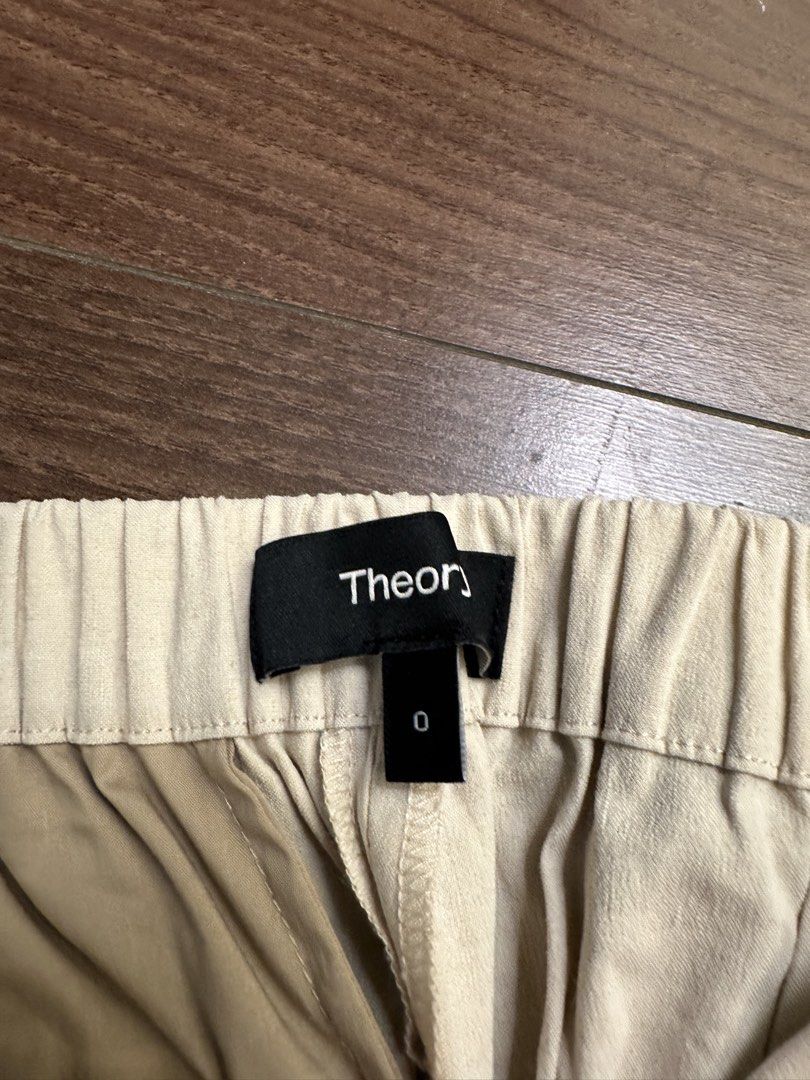 Theory Beige Elastic Waist Pants Size 0 (Category: Other Bottoms) located in Quezon City. Submitted by bqchane (Listing ID 1455357810, Image 2). Description: - Theory Pants - Color: Light Beige - Size: 0 - Features: Elastic waistband, straight leg cut - Style: Simple, classic, versatile for everyday or dressing up.