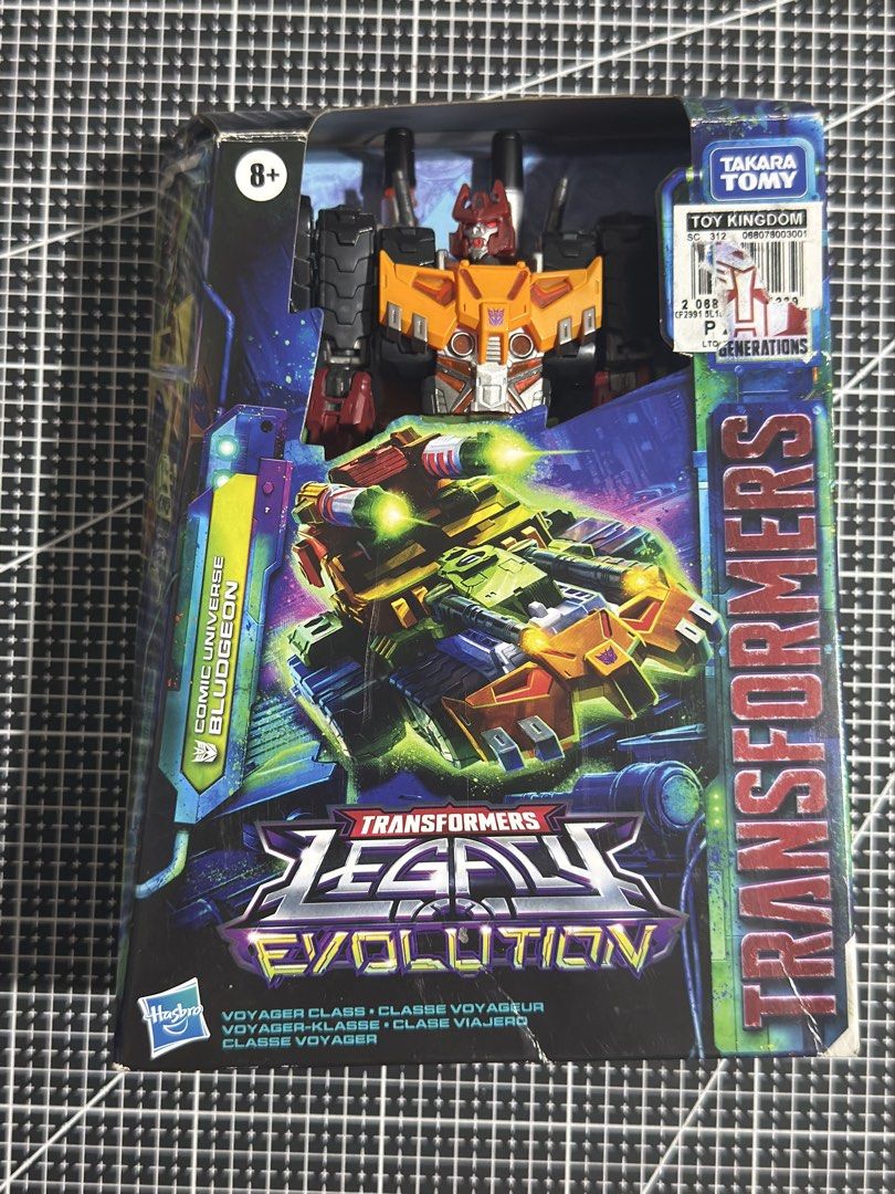Transformers Legacy Evolution Voyager Class Bludgeon (Category: Action & Battle Toys) located in Marilao. Submitted by rjfrancisco23 (Listing ID 1455371455, Image 1). Description: - Transformers Legacy Evolution Voyager Class Bludgeon - Comic Universe version - Box has minor shelf wear - Perfect for Transformers collectors Back In Box Never Been Transformed .