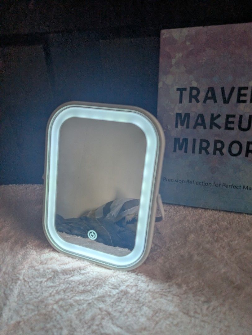 Travel Makeup Mirror with Light (16 x 20 cm) (Category: Makeup) located in Marikina City. Submitted by mrtncdrc (Listing ID 1455369550, Image 3). Description: Item is brand new. Comes with a carry case so it has protection when travelling. Charged via usb C. 3 light settings..