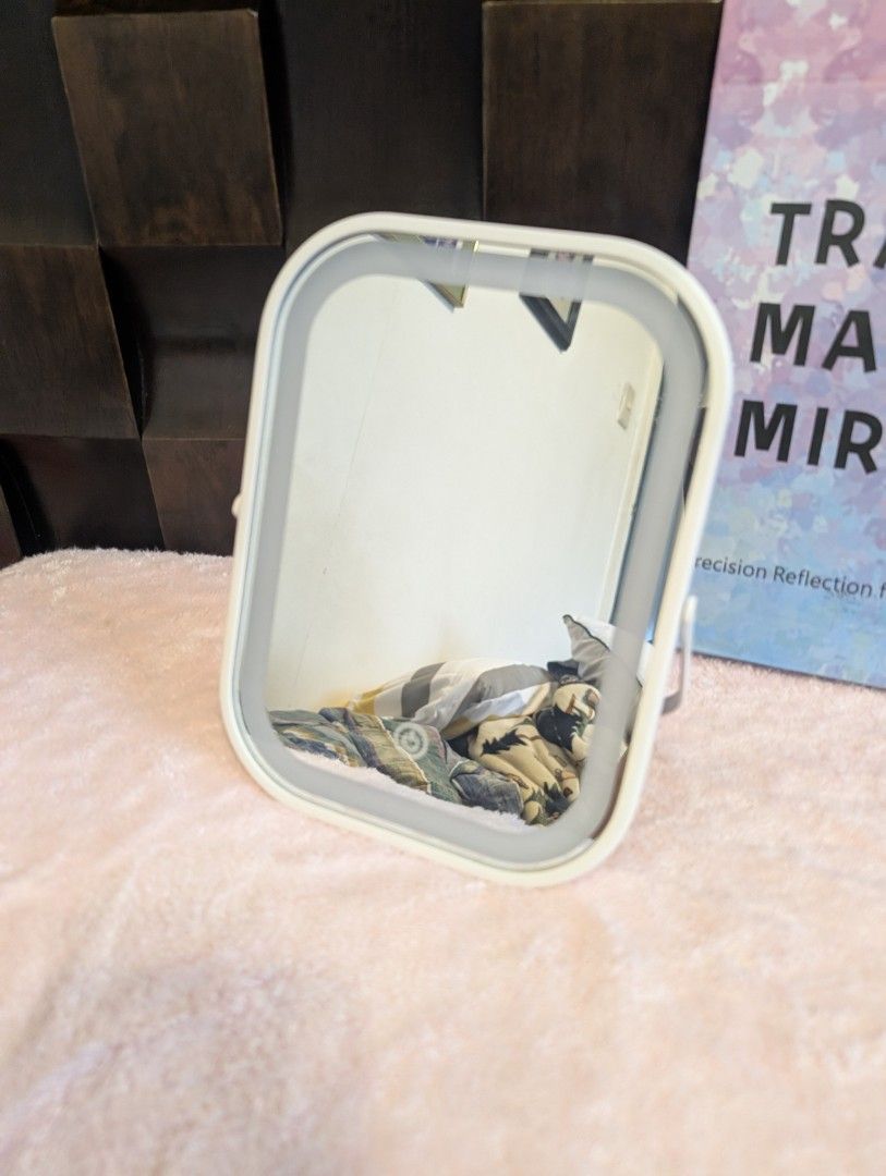 Travel Makeup Mirror with Light (16 x 20 cm) (Category: Makeup) located in Marikina City. Submitted by mrtncdrc (Listing ID 1455369550, Image 2). Description: Item is brand new. Comes with a carry case so it has protection when travelling. Charged via usb C. 3 light settings..