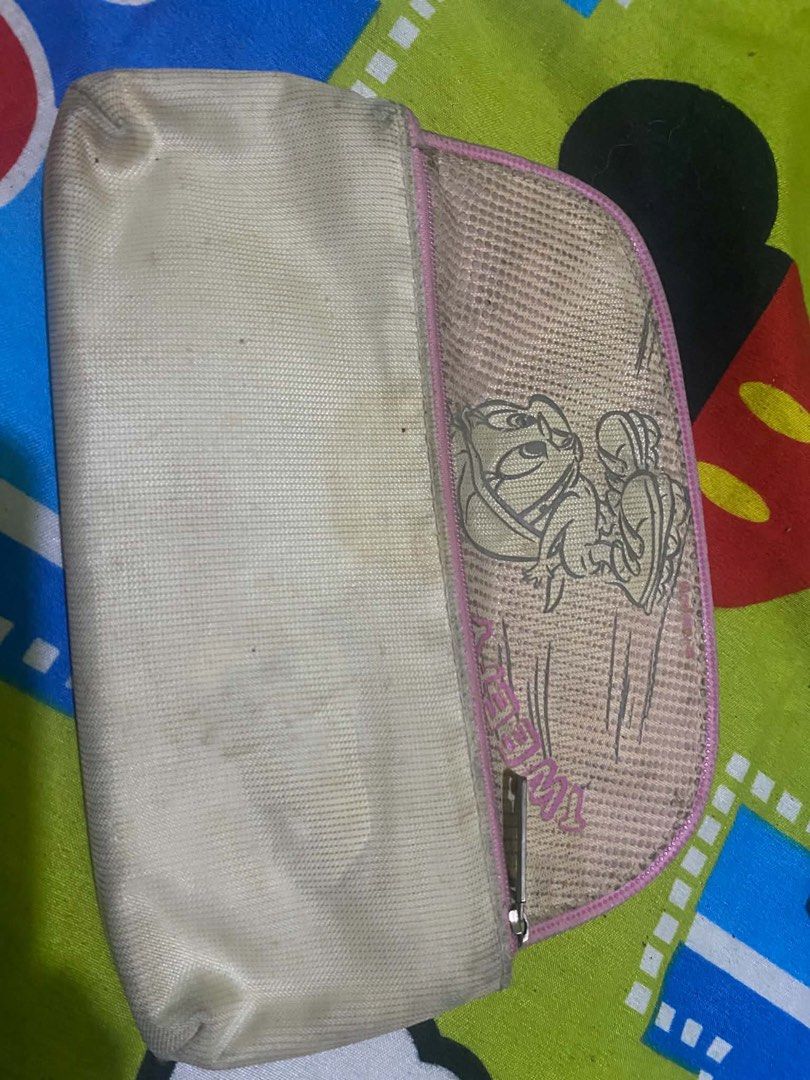 Tweety Bird Pencil Case Pouch (Category: Purses & Pouches) located in Caloocan City. Submitted by JennMT (Listing ID 1455331165, Image 3). Description: - Adorable Tweety Bird design - Secure zipper closure - Internal velcro for extra security - Versatile use: stationery, makeup, or small essentials - Shows some signs of wear, but fully functional - A must-have for Tweety Bird fans!.