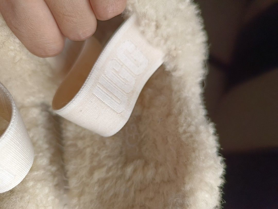 UGG Fluff Sandals Slide Slippers Cream RUSH SALE! (Category: Slippers and slides) located in Mandaluyong City. Submitted by mskitty_02 (Listing ID 1455369043, Image 3). Description: - Cream UGG Fluff Yeah slides -Fixed Price -Size 36 can also fit US 6 ( Im US 6 , 36-37 ) -Selling low -100% Original - Super soft and fluffy material - Elastic strap at the back with UGG logo - Platform sole for added style and comfort - Ideal for lounging or quick e