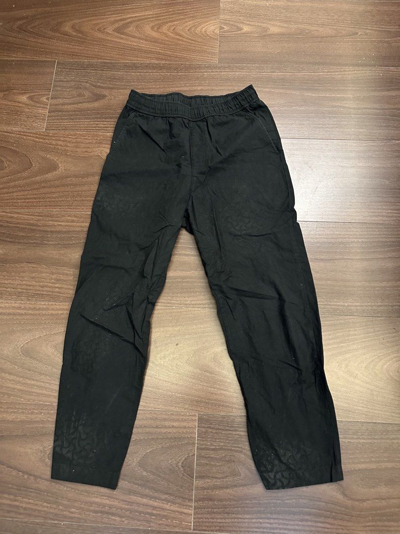 Uniqlo Black Ankle Pants XS (Category: Other Bottoms) located in Quezon City. Submitted by bqchane (Listing ID 1455357891, Image 1). Description: - Brand: Uniqlo - Color: Black - Material: 100% Cotton - Waistband: Elastic - Size: XS - Measurements: Waist 57-63cm, Hip 82-88cm - Features: Subtle patterned fabric detail - Occasion: Great for everyday wear.