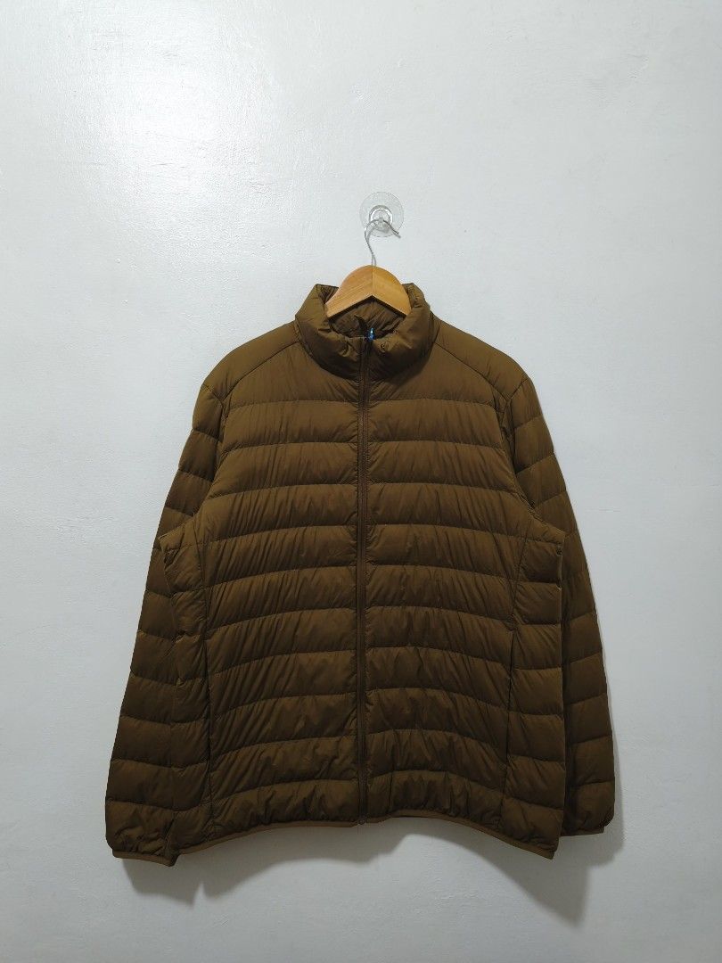 Uniqlo Brown Light Puffer Jacket Men XL (Category: Coats, Jackets and Outerwear) located in Balanga. Submitted by winterlab_ph (Listing ID 1455466278, Image 2). Description: Code: A560 Width: 24 Length: 28.5 Shoulders: 19.5 Sleeves: 26.