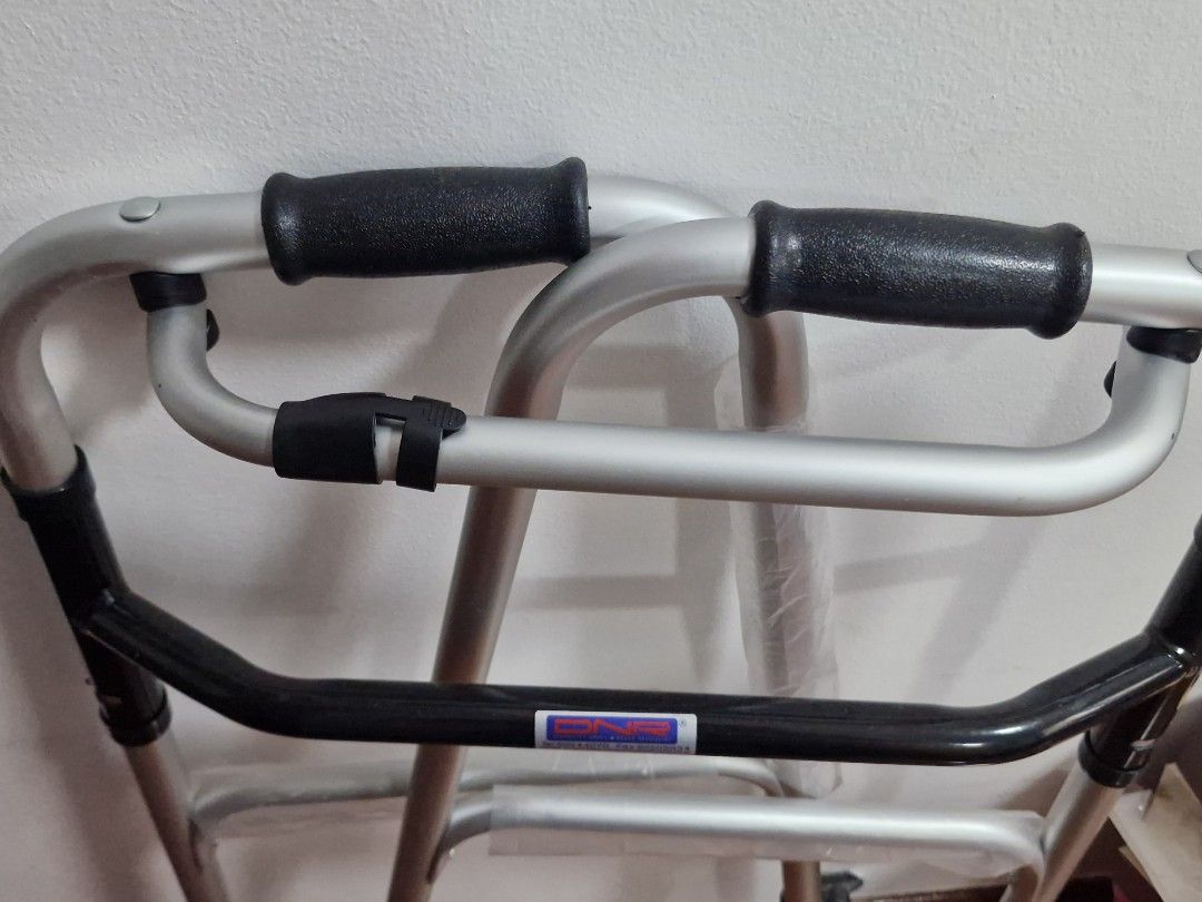 Walker for elderly (Category: Rehabilitative Devices) located in Singapore. Submitted by SAM_that_happy_go_lucky_guy (Listing ID 1455415548, Image 2). Description: Brand New. Never used. Bill available. - Sturdy walker designed for elder users - Lightweight aluminum frame for easy handling - Comfortable, non-slip grips for secure support - Provides enhanced stability and independence - In excellent, pre-loved condition.