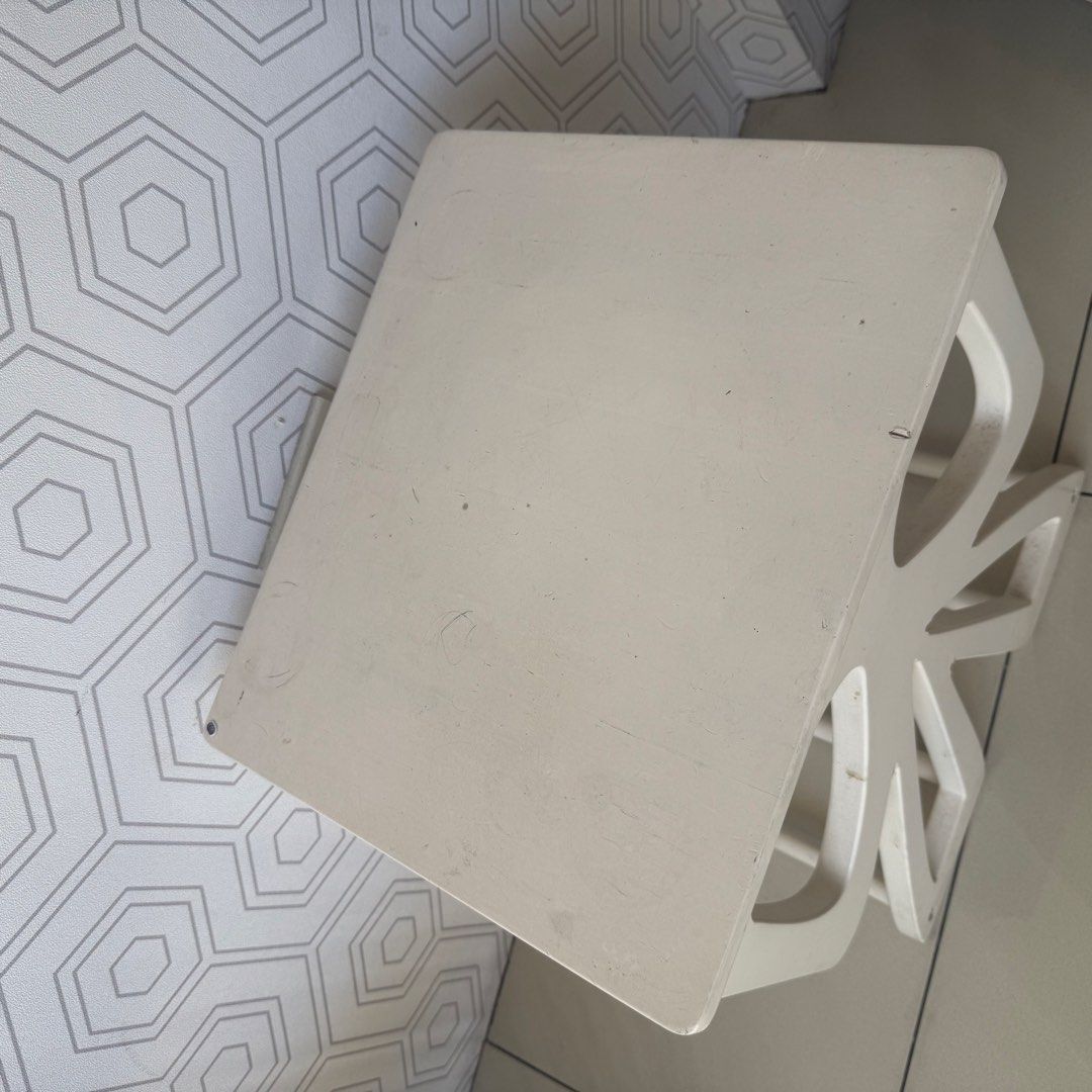 White Bow Design Side Table (Category: Tables & Sets) located in Marikina City. Submitted by lovegoeson (Listing ID 1455484168, Image 3). Description: - Cute white side table with unique bow-designed legs. - Versatile: Perfect as a small accent table or a bedside table. - Condition: Top surface has some marks and scuffs from normal use. - Overall: A charming piece that will add character to any room..