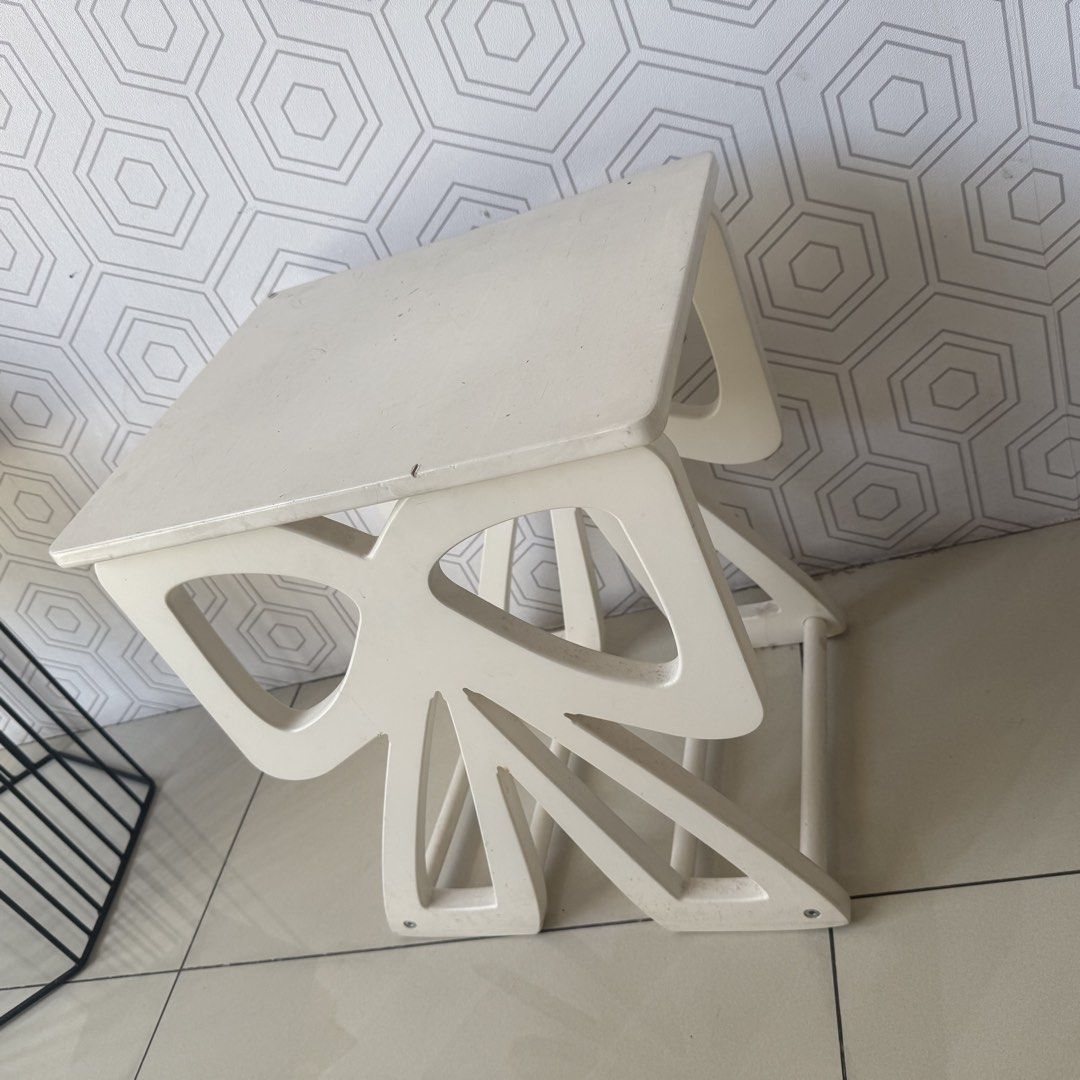 White Bow Design Side Table (Category: Tables & Sets) located in Marikina City. Submitted by lovegoeson (Listing ID 1455484168, Image 2). Description: - Cute white side table with unique bow-designed legs. - Versatile: Perfect as a small accent table or a bedside table. - Condition: Top surface has some marks and scuffs from normal use. - Overall: A charming piece that will add character to any room..