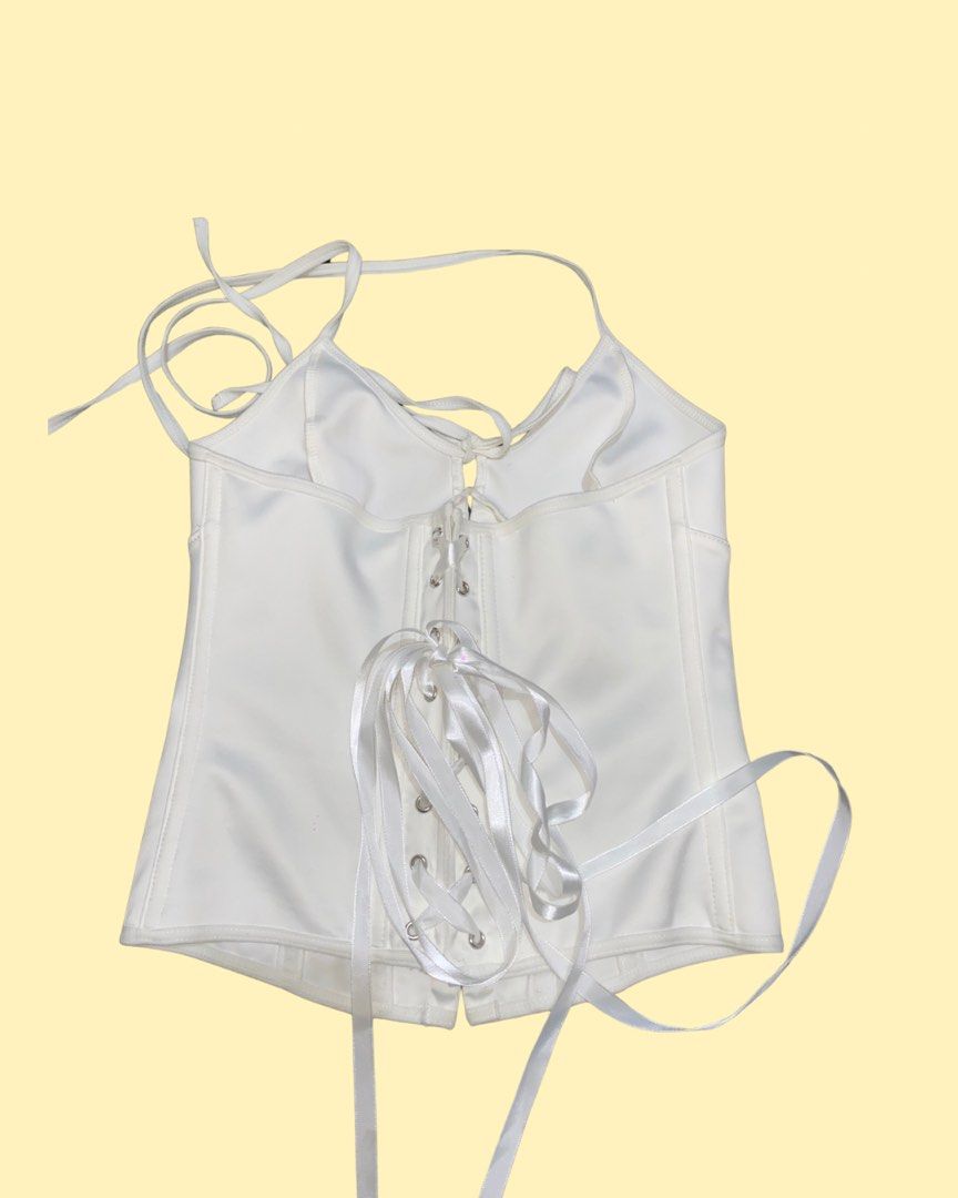 White Halter Corset Top (Category: Sleeveless) located in Baguio. Submitted by brockhmpton (Listing ID 1455411183, Image 2). Description: xs on tag just tried it on (never been used).