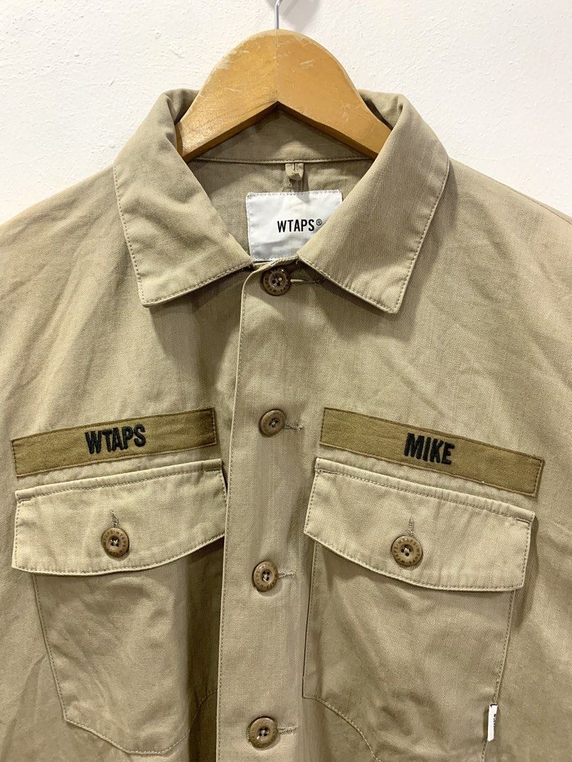 WTAPS BUDS LONGSLEEVE SHIRT (Category: Formal Shirts) located in Cavite. Submitted by ___layern0ne (Listing ID 1455477297, Image 2). Description: About the product: • Features "WTAPS" and "MIKE" patches on chest pockets • Button-up front • Two chest pockets • WTAPS tag at hem Tagged Size: 02 Armpit to Armpit (front): 24 inches Shoulder to Shoulder: 20.5 inches Sleeve Length: 25 inches Length: 28 inches Measured laid flat and at its longest point 