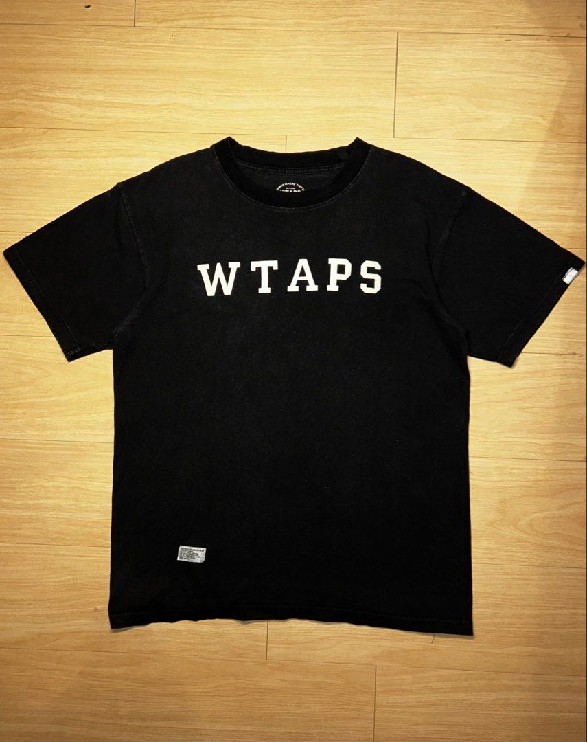 WTAPS T-Shirt Black (Category: Tshirts & Polo Shirts ) located in Manila. Submitted by sevyph (Listing ID 1455325721, Image 1). Description: - Black WTAPS T-shirt - Features iconic WTAPS logo printed on the front - Small tag detail on the lower left hem - Ideal for casual and everyday wear.