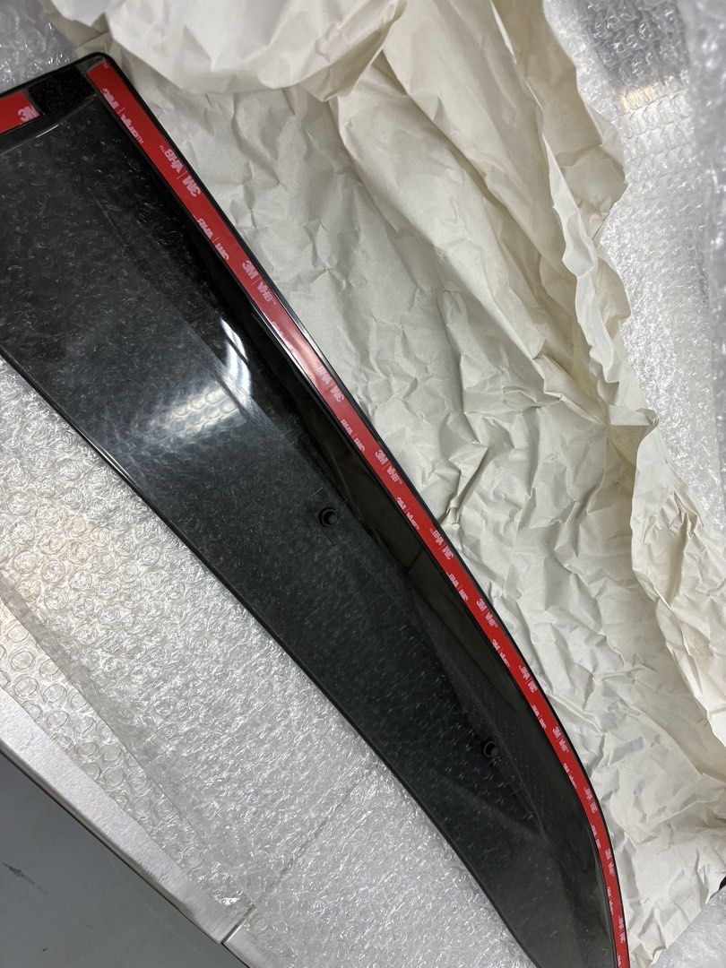 Yaris Cross Visor (Category: Racks & Protection) located in Singapore. Submitted by culwen (Listing ID 1455460708, Image 3). Description: $25 As good as new, all tapes are new. No scratches. These are not opaque black like the cheaper ones. This mimics the OEM Toyota where it looks dark from external but actually a lot clearer from the cabin view. .