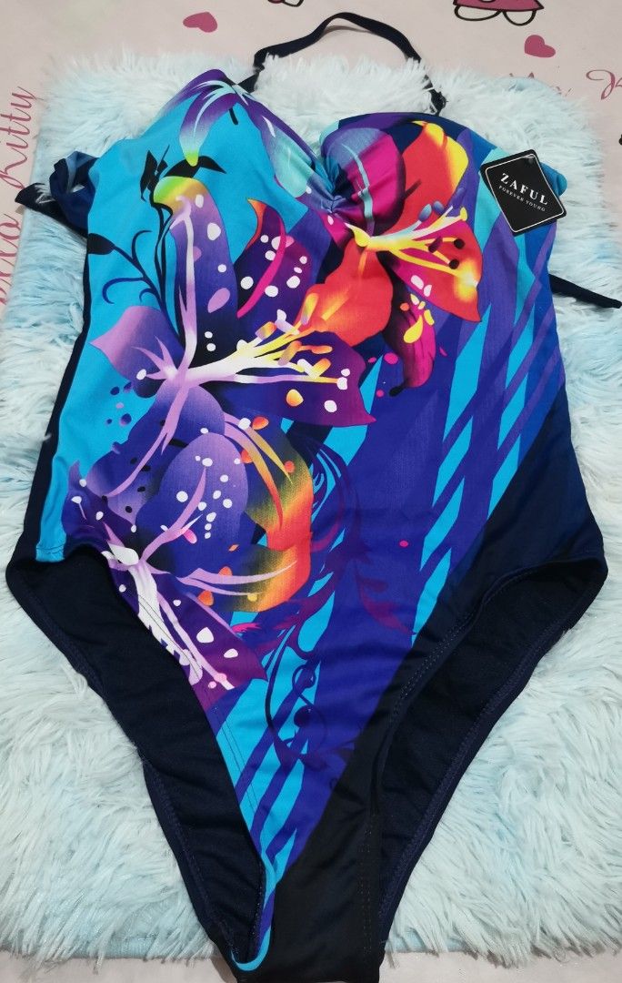 Zaful Floral One-Piece Swimsuit (Category: Bikinis & Swimsuits) located in Quezon City. Submitted by annef (Listing ID 1455475314, Image 2). Description: - Vibrant floral print one-piece swimsuit - Halter neck with adjustable straps - Flattering cut - Ideal for beach or pool - Get ready for summer!.