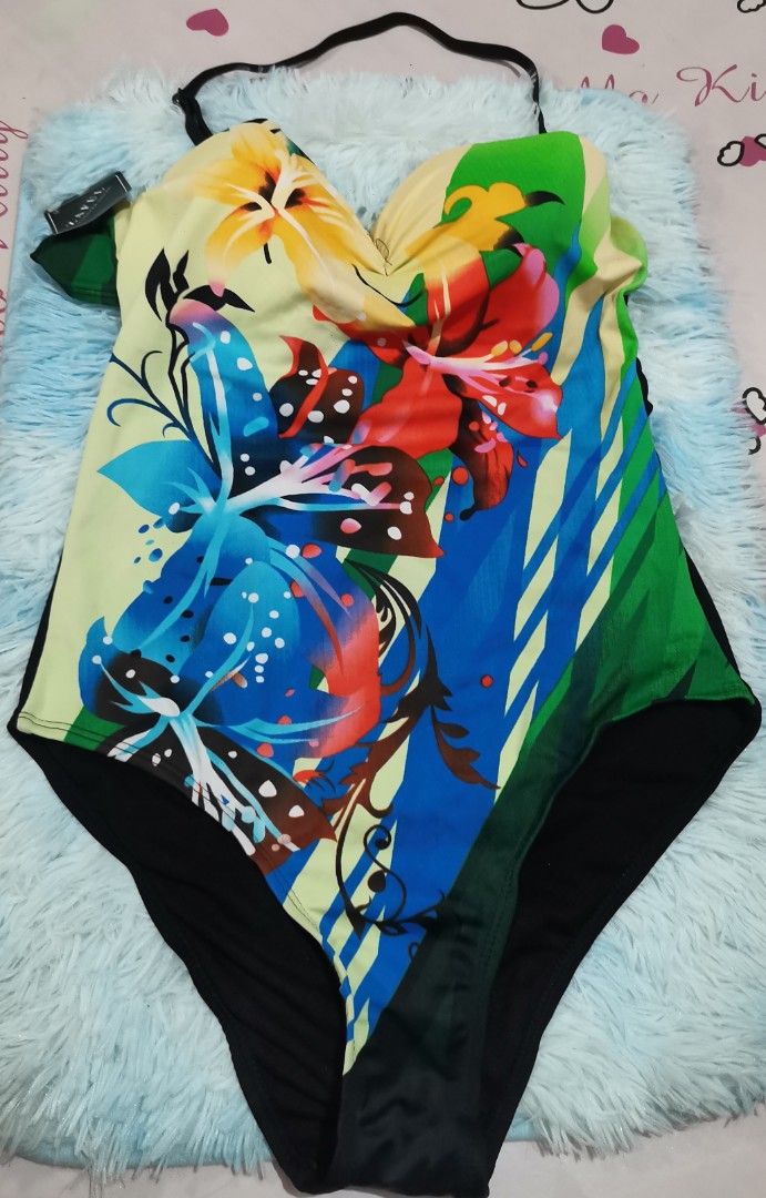 Zaful Floral One-Piece Swimsuit (Category: Bikinis & Swimsuits) located in Quezon City. Submitted by annef (Listing ID 1455475314, Image 1). Description: - Vibrant floral print one-piece swimsuit - Halter neck with adjustable straps - Flattering cut - Ideal for beach or pool - Get ready for summer!.