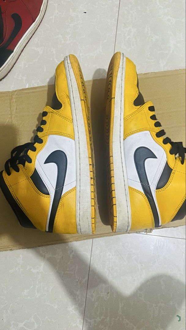 Air Jordan 1 High Yellow Black White (Category: Sneakers) located in Bulacan. Submitted by jamescarl1421 (Listing ID 1455583389, Image 3). Description: Selling my Air Jordan 1 Mid “Taxi” / Yellow Toe in US Men’s 10 / UK 9 / EU 44. * Style code: 554724-701 * Colorway: Taxi / White / Black * Original Jordan box included * Black laces * Used condition * Shows normal signs of wear/creasing from use * Midsoles/outsoles have some dirt and wear, as show